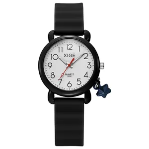 Classic quartz watch for students with black silicone strap and blue star pendant
