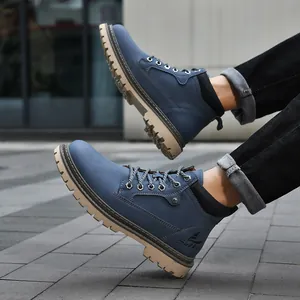 Men's blue high-top work boots with non-slip rubber soles and casual outdoor style