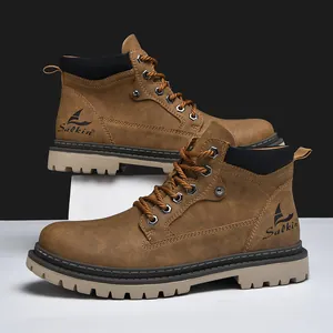 Brown mid-top work boots with textured leather and thick anti-slip rubber outsoles