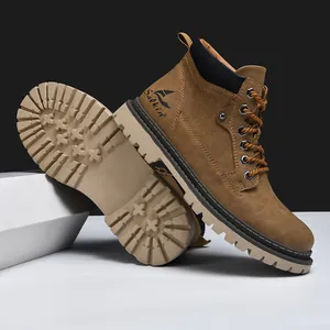 Detailed view of the anti-slip rubber outsole and brown upper of the men's work boots