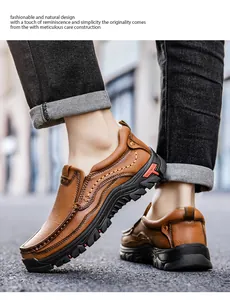 Detail of brown leather outdoor shoe with contrast stitching and non-slip rubber sole