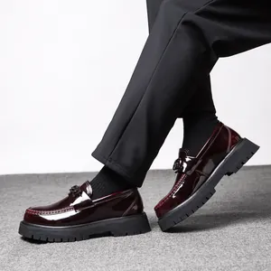 Men's dark burgundy patent leather loafers with thick non-slip soles and metal buckle