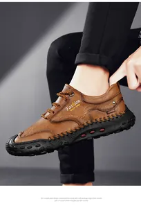 Detail of brown leather casual shoe with hand-stitched seams and rubber outsole