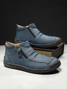 Blue men outdoor leather boots featuring handmade stitching and side zipper closure