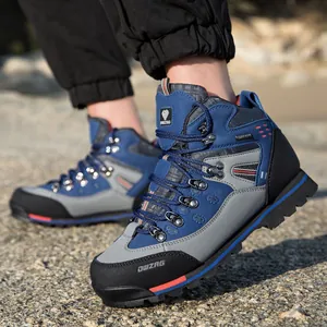 Botas de senderismo de cuero azul con suelas antideslizantes para actividades al aire libre