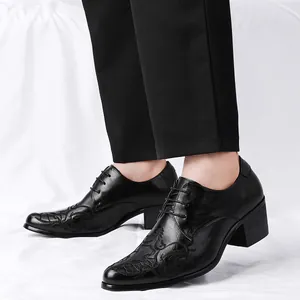 Men's black Cuban shoes with intricate floral embroidery and stylish Cuban heels