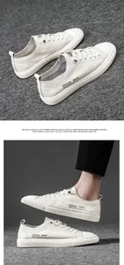 Macro detail of white leather casual sneaker showing SOCIAL MAN text and flexible rubber sole