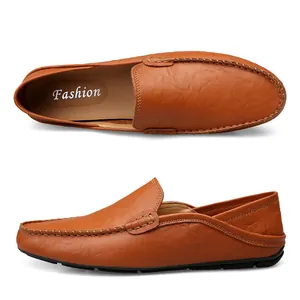Detailed view of brown leather loafers with moccasin stitching and anti-slip rubber soles
