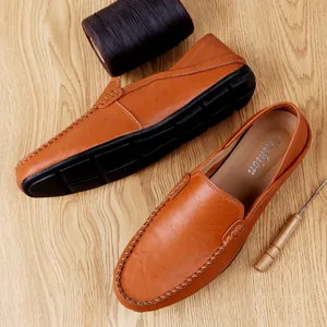 Classic men's brown leather loafers with hand-stitched detailing and non-slip rubber soles