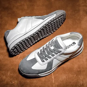 Classic leather sneakers with non-slip rubber soles in a retro sport style