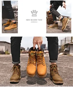 Detailed view of high-top nubuck leather work boots with non-slip rubber soles for men