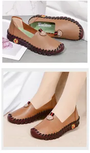 Detailed view of hand-stitched leather loafers with non-slip red rubber soles for women