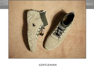 Top view of men's khaki suede boots with green knit collar and speed lacing system