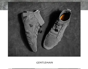 Top view of dark grey high-top sneaker with knitted collar and textured rubber sole