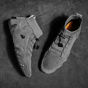 Grey high-top men's nubuck leather sock boots with knit ankle and toggle laces