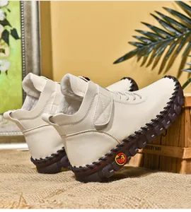 Detail showing plush fleece lining and durable hand-stitched thick rubber sole on winter boots