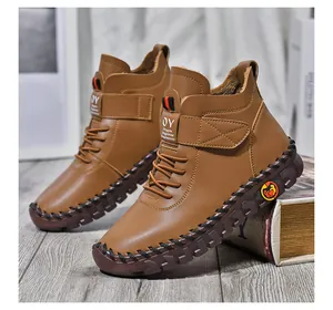 Detail of hand-stitched sole on brown warm winter leather boots with plush lining