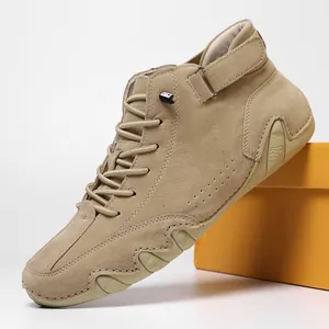 Men's khaki suede high-top sneakers featuring velcro ankle straps and wave-shaped outsoles