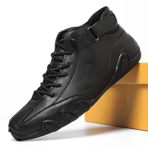 Classic black leather mid-top casual men's boots with lace-up and velcro strap detail