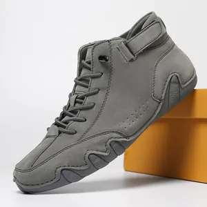 Cold grey high-top men casual boots in matte suede with wave-shaped rubber soles