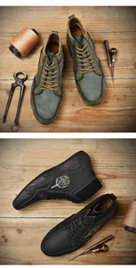 Close-up of military green and black mid-top leather boots with stitched soles and warm lining