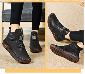 Detail view of black warm winter boots featuring textured anti-slip soles and velcro straps