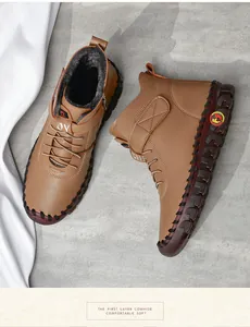 Detail view of brown warm boots with first layer cowhide leather and soft plush lining