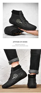 Detail of high-top men's sneakers with leather paneling and logo on side