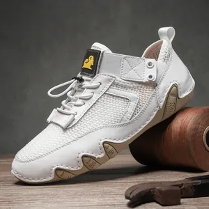 Scarpe sportive da uomo bianche traspiranti con sistema di allacciatura rapida e gomma