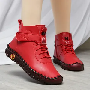 Women's warm red leather ankle boots with plush lining and soft non-slip soles