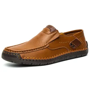 Brown leather men's slip-on casual shoes with hand-stitched details and durable rubber sole