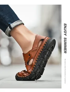 Close-up of flexible brown leather men's sandals with hand-stitched details and rubber sole
