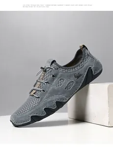 Détails de baskets grises pour hommes avec mesh respirant et système de lacets élastiques