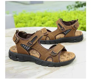 Detail of men's leather sandals with adjustable velcro straps and non-slip rubber soles