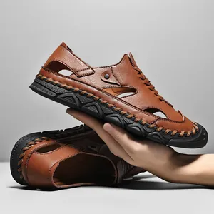 Men's brown genuine leather beach sandals with woven hollow design and thick rubber sole