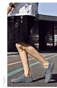 Detailansicht der grauen, atmungsaktiven Herren-Mesh-Walking-Schuhe mit Schnürung