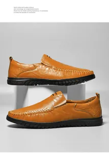 Detailed view of brown leather loafers featuring soft rubber soles and hand-stitched seams