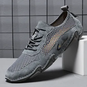 Herren Sneaker aus grauem Leder und Mesh mit atmungsaktiven Wildledereinsätzen