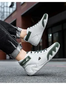 Detail of LDECK high-top sneakers in white and green suede with lace-up closure and heel support