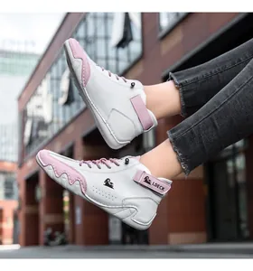 Close-up of women high-top sneakers in white and pink leather with LDECK side logo