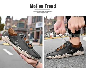 Detail van handgemaakte stiksels en grijze leertextuur op casual herenschoenen