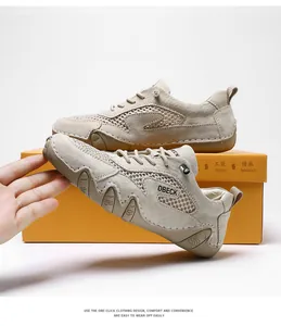 Dettaglio scarpe mesh beige flessibili con finiture in camoscio e scatola arancione