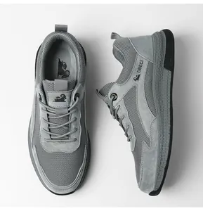 Overhead view showing grey mesh and suede texture on breathable men's sneakers