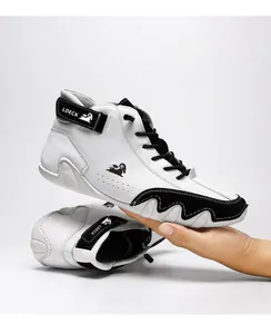 Detail of high-top casual sneakers with black and white contrast and wave-patterned sole