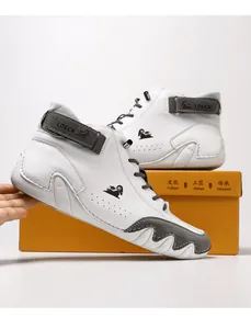 Detail view of LDECK white leather high-top sneaker with gray suede texture accents