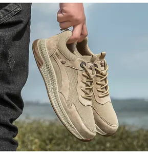 Detail of khaki leather mesh sneakers showing breathable texture and anti-slip rubber sole