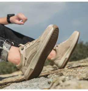 Detail view of khaki leather mesh sneakers with durable anti-slip rubber outsoles