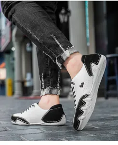 Detail of color-block casual shoes showing leather texture and wave anti-slip sole