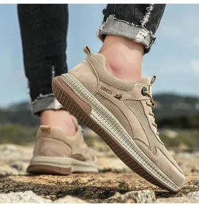 Detail view of khaki men shoes with non-slip rubber sole and breathable mesh upper