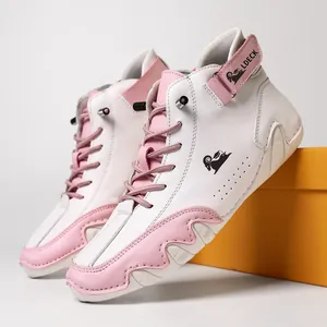 Pink and white high-top leather boots with rubber sole and buckle strap design
